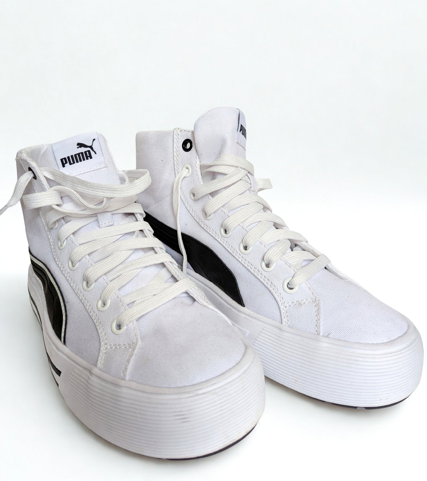 Puma black and white high tops