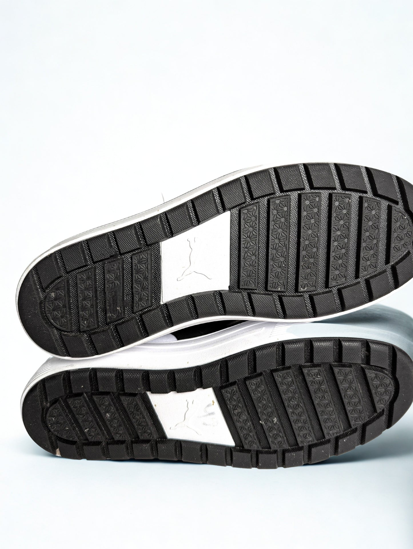 Puma black and white high tops
